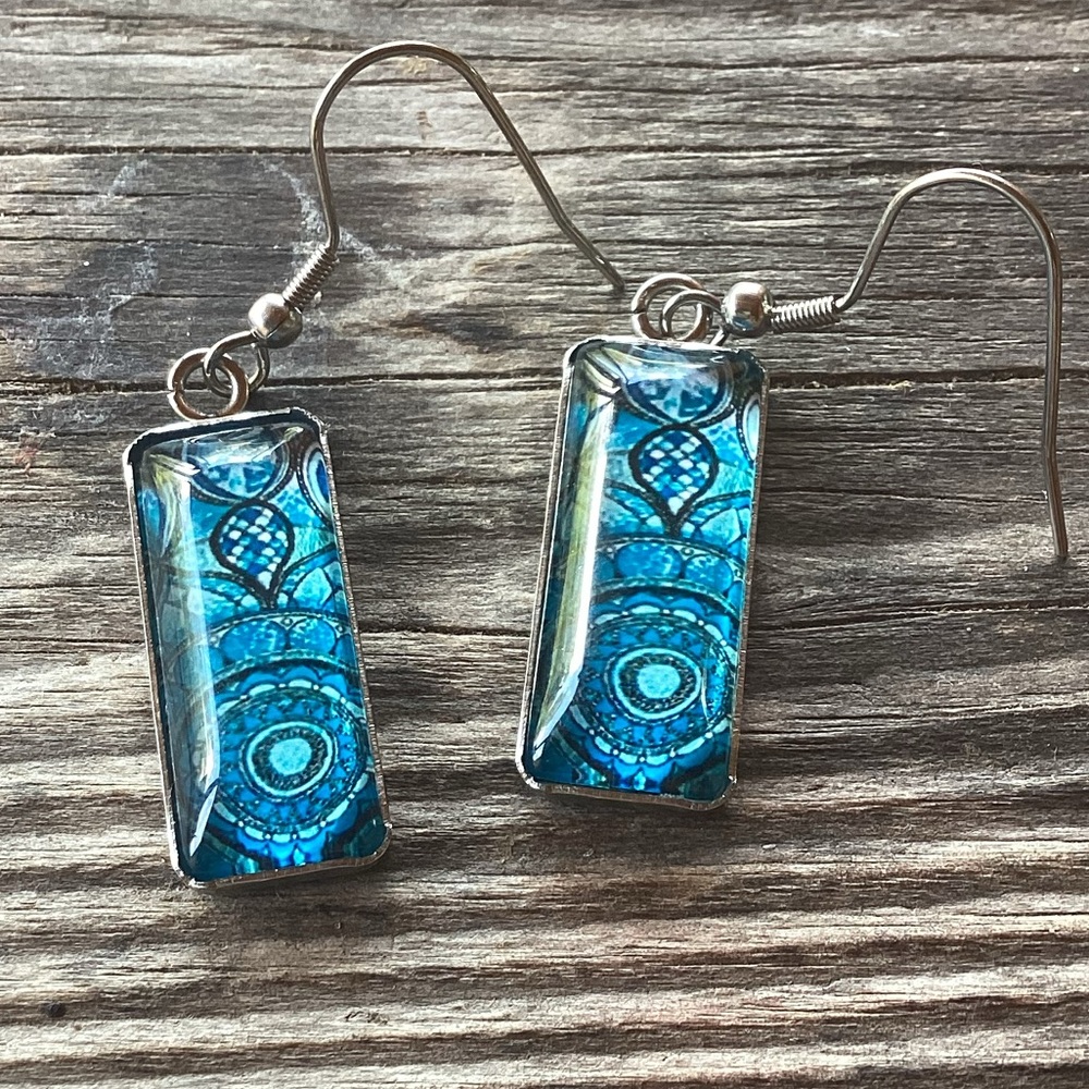 Mandala design turquoise color earrings with fish hook type dangle